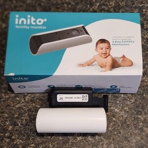 Inito Fertility Monitor with IPhone 15 Pro clip